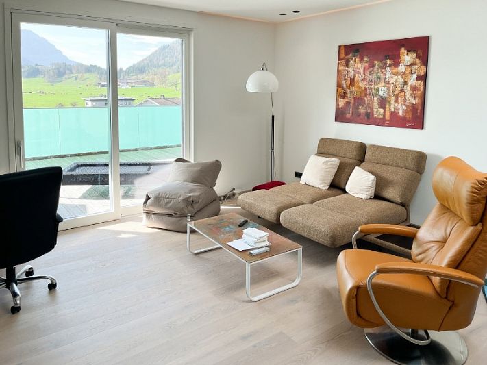 Luxuriöses Penthouse mit großer Terrasse und unverbauten Blick in die Kössener Bergwelt