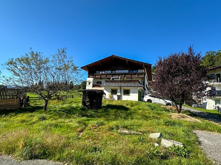 Sonniges Grundstück mit Altbestand in Westendorf zu verkaufen