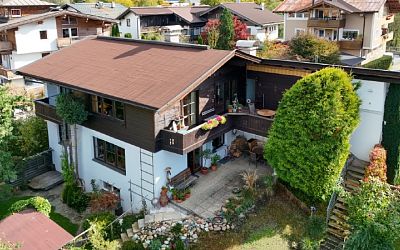 Zwei miteinander verbundene Gartenwohnungen in zentraler Lage von St. Johann auf Leibrentenbasis zu verkaufen