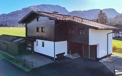 Wohnhaus mit Teilfreizeitwohnsitzwidmung in absoluter Ruhelage und unverbautem Bergblick in Kössen zu verkaufen