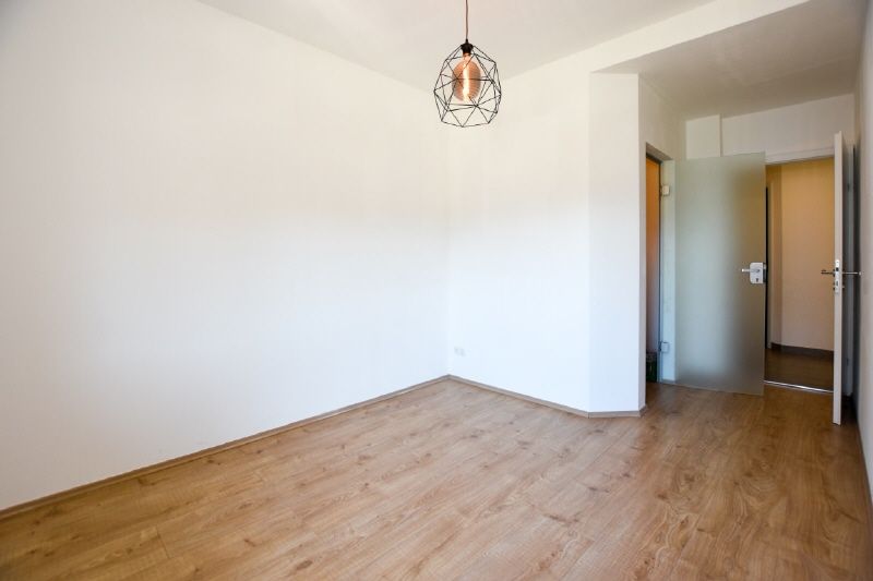 Zentral wohnen in St. Johann in Tirol – charmante 4-Zimmer-Wohnung mit Balkon